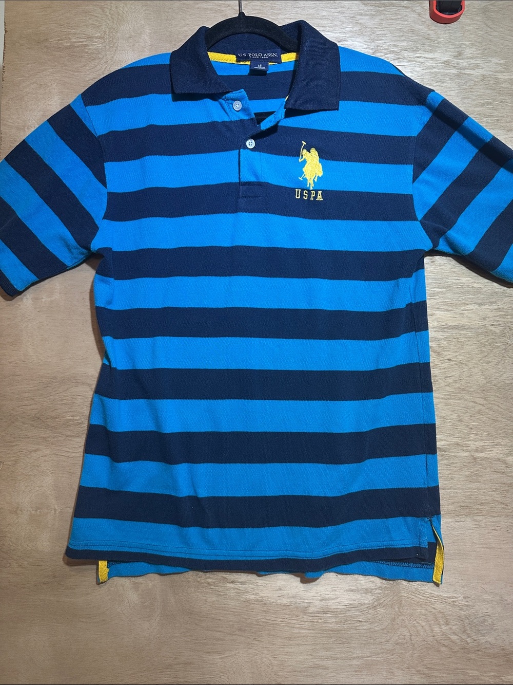 U.S. Polo Assn. Blue and Navy Striped Polo with Yellow Logo